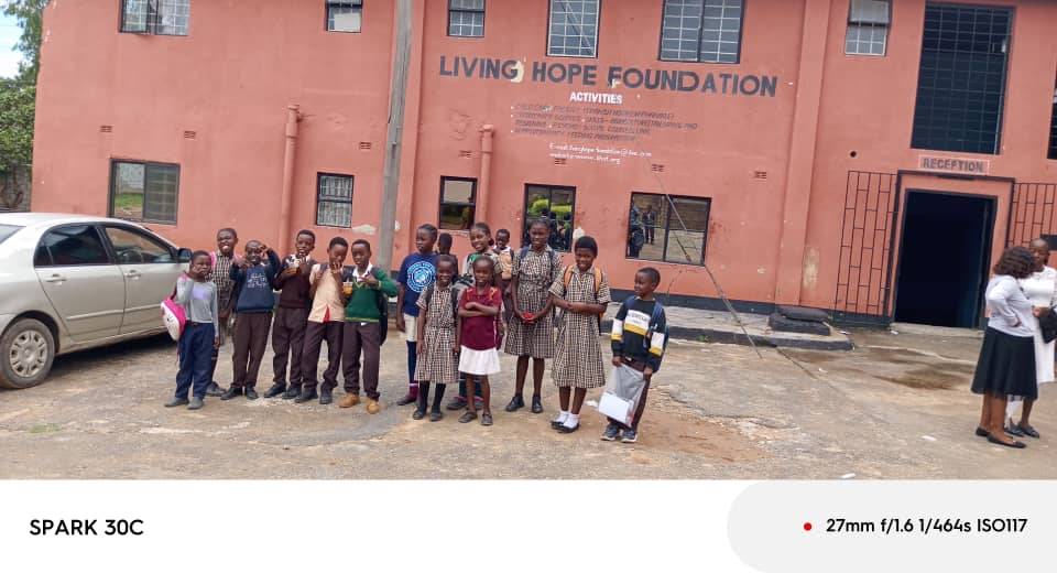 Children outside Living Hope Foundation